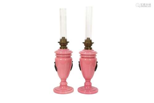 A PAIR OF PINK OPALINE VASES CONVERTED INTO OIL LAMPS Possib...