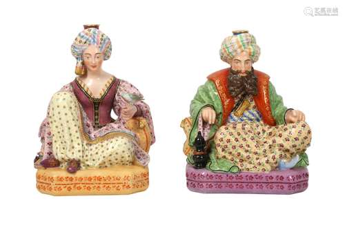 A PAIR OF JACOB PETIT PORCELAIN FIGURAL FLASKS OF A SEATED S...