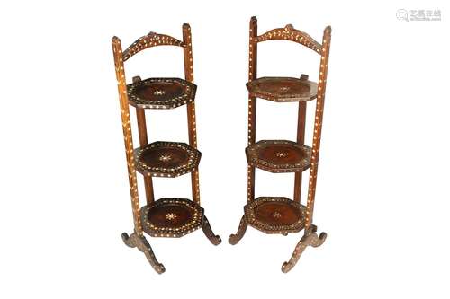 λ A NEAR PAIR OF HARDWOOD IVORY-INLAID ANGLO-INDIAN TIERED T...