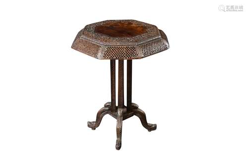 AN OCTAGONAL KASHMIRI CARVED HARDWOOD TABLE Kashmir, Norther...