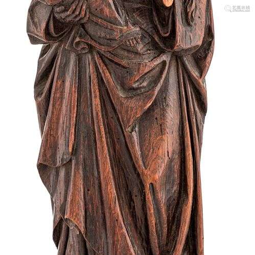 Vierge à l’Enfant en chêne sculpté, base monoxyle.Dans le st...