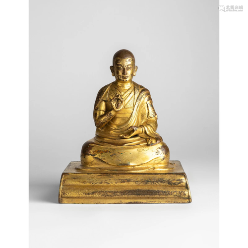 GILT BRONZE SEATED FIGURE OF A LAMA QING DYNASTY, 17TH