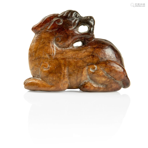 RUSSET JADE CARVING OF A MYTHICAL ANIMAL SONG TO YUAN