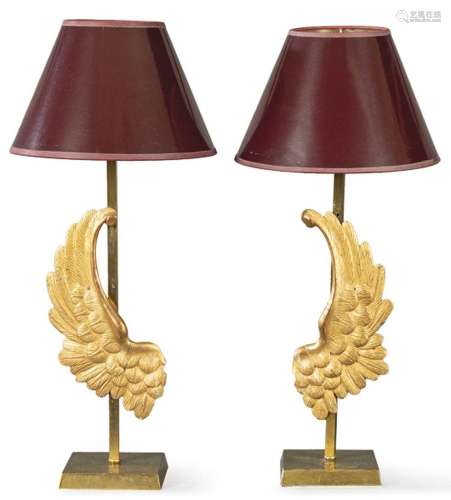 Pair of gilded metal table lamps with carved and gilded wood...