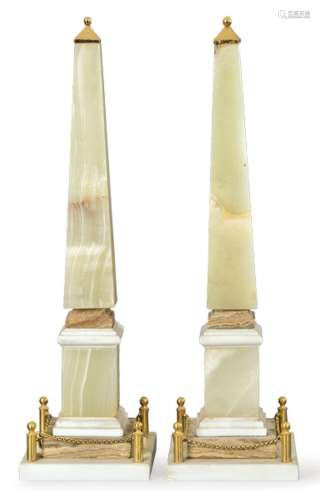 Pair of obelisks in onyx, white marble, veined marble and br...