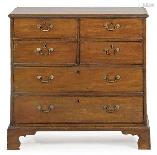 George III chest of drawers in mahogany, with an arrangement...