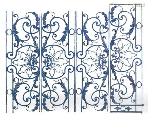 Four wrought iron railings painted in blue ff. 19th century....