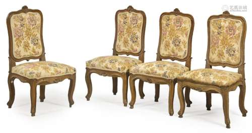Set of four Louis XV chairs with queen back, in carved walnu...