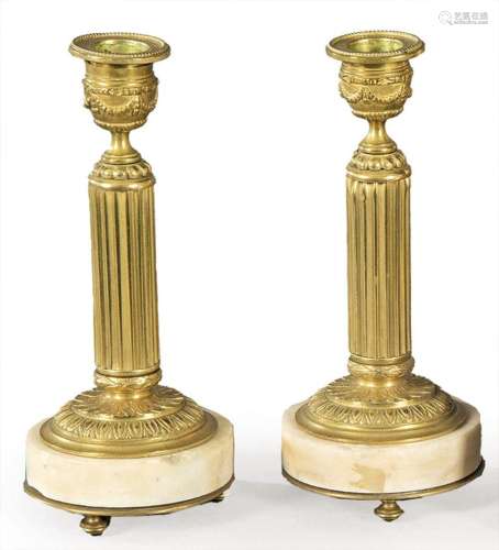 Pair of gilded bronze and white marble candlesticks, France ...