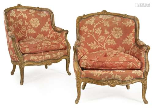 Pair of Louis XV armchairs in carved walnut wood, with flora...
