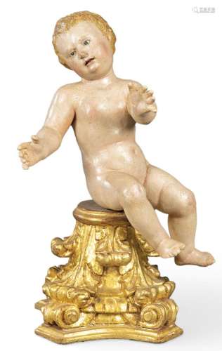 . "Seated Infant Jesus" in carved and polychrome w...