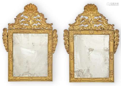 Pair of Baroque mirror frames in wood and gilded with carved...