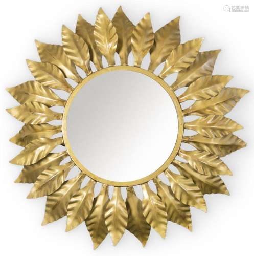 Sunburst mirror frame with concentric leaves in gilded metal...