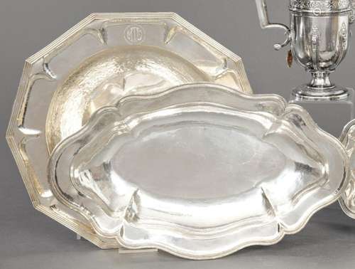 Set of two serving trays of Peruvian punched silver Law 900....