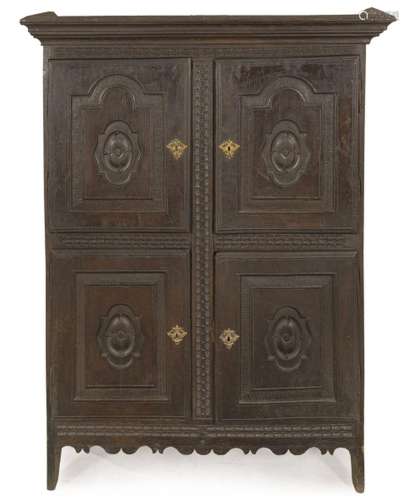 Two-section wardrobe with molded and carved chestnut doors, ...