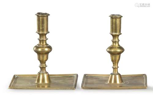 Pair of gilt bronze candlesticks, Spain 17th century. With l...