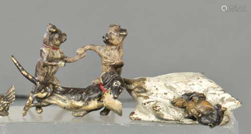 Three Dogs in Different Attitudes made in polychrome bronze,...