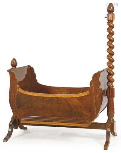 Tilting biedermeier cradle in mahogany wood and carved mahog...