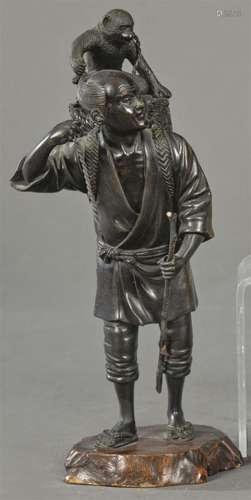 Peasant with Monkey in patinated bronze, Japan, Meiji Period...