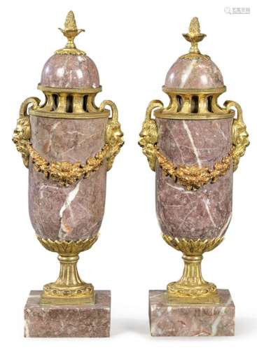 Pair of urns convertible into candlesticks in pink marble ma...
