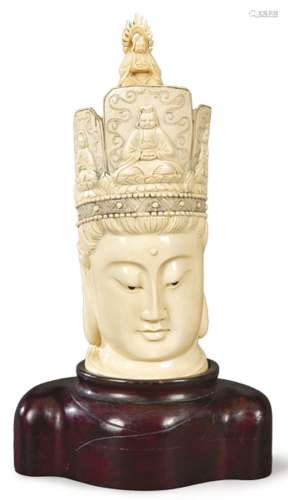 Guanyin carved in ivory and wood, China first third S. XX. H...