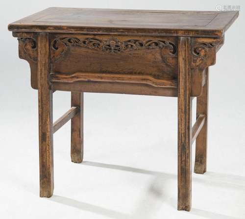Chinese console in elm wood. With vegetable carving on the f...