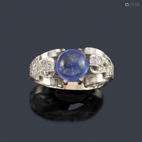 Cabochon central sapphire ring with rose cut diamo…
