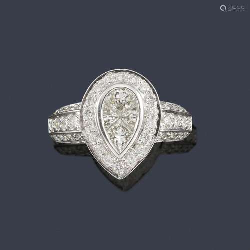 Knob-shaped front ring set with fancy-cut diamonds…