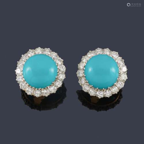Short earrings with a pair of turquoise cabochons …