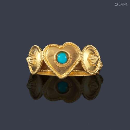 Ring with a central motif in the shape of a heart …