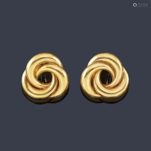 Knot-shaped earrings in 18K yellow gold. …