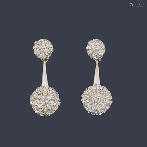 Long earrings with double spherical motif in pavé …