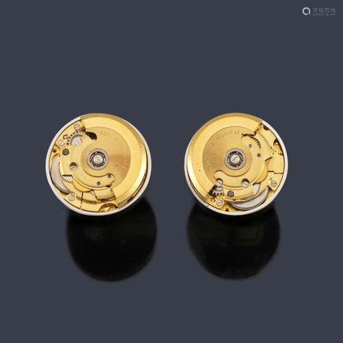 Cufflinks with clockwork made of silver. …