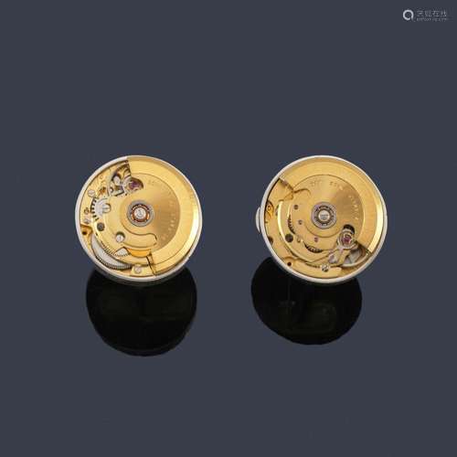 Cufflinks with clockwork made of silver. …