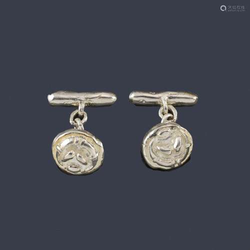 Cufflinks in the shape of a 'pig tablet' made of s...