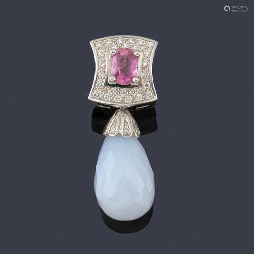 Pendant with an oval cut pink sapphire center of a…