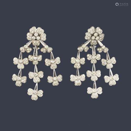 Long earrings with floral motifs with brilliants o…