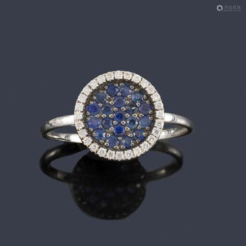 Ring with circular motif with sapphire pavé and bo…