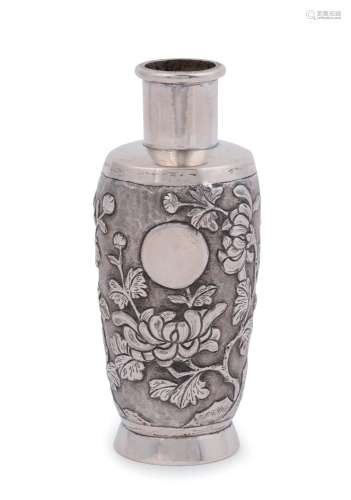 An antique Chinese export silver vase with embossed floral m...