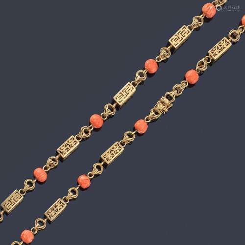 Long necklace with spherical coral beads intersper…