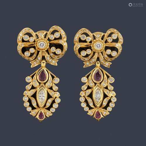 Long earrings with rubies and brilliant cut diamon…