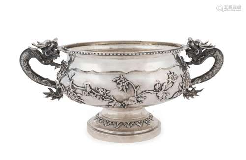 An impressive Chinese silver bowl with embossed floral motif...