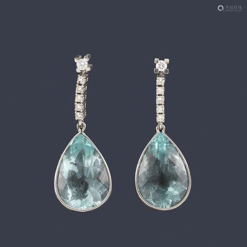 Long earrings with a pair of knob-cut aquamarines …