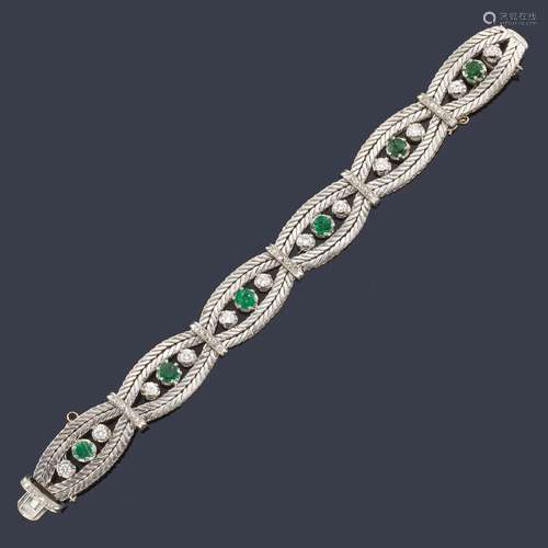 Articulated 18K white gold bracelet with emeralds …