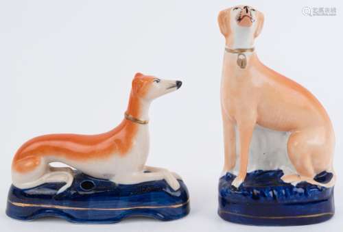 Two antique Staffordshire pottery dog statues, 19th century,...