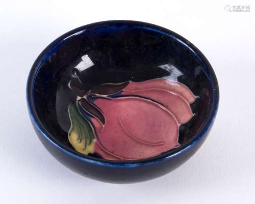 MOORCROFT "Magnolia" pattern dish on blue ground, ...