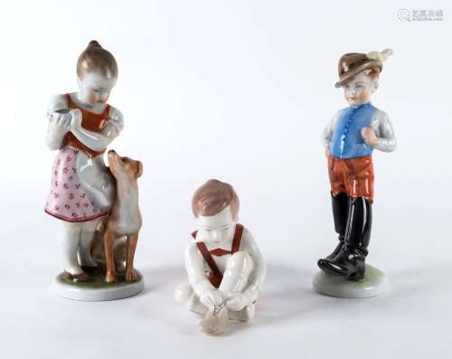 Three Herend porcelain figures of children, mid 20th century...