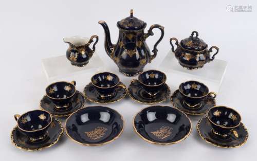 A German blue and gilt porcelain coffee set comprising six c...