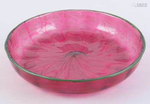 An antique ruby glass bowl with applied green rim, circa 190...