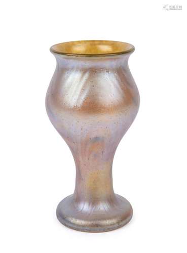 An antique iridescent art glass vase, possibly Steuben or Lo...